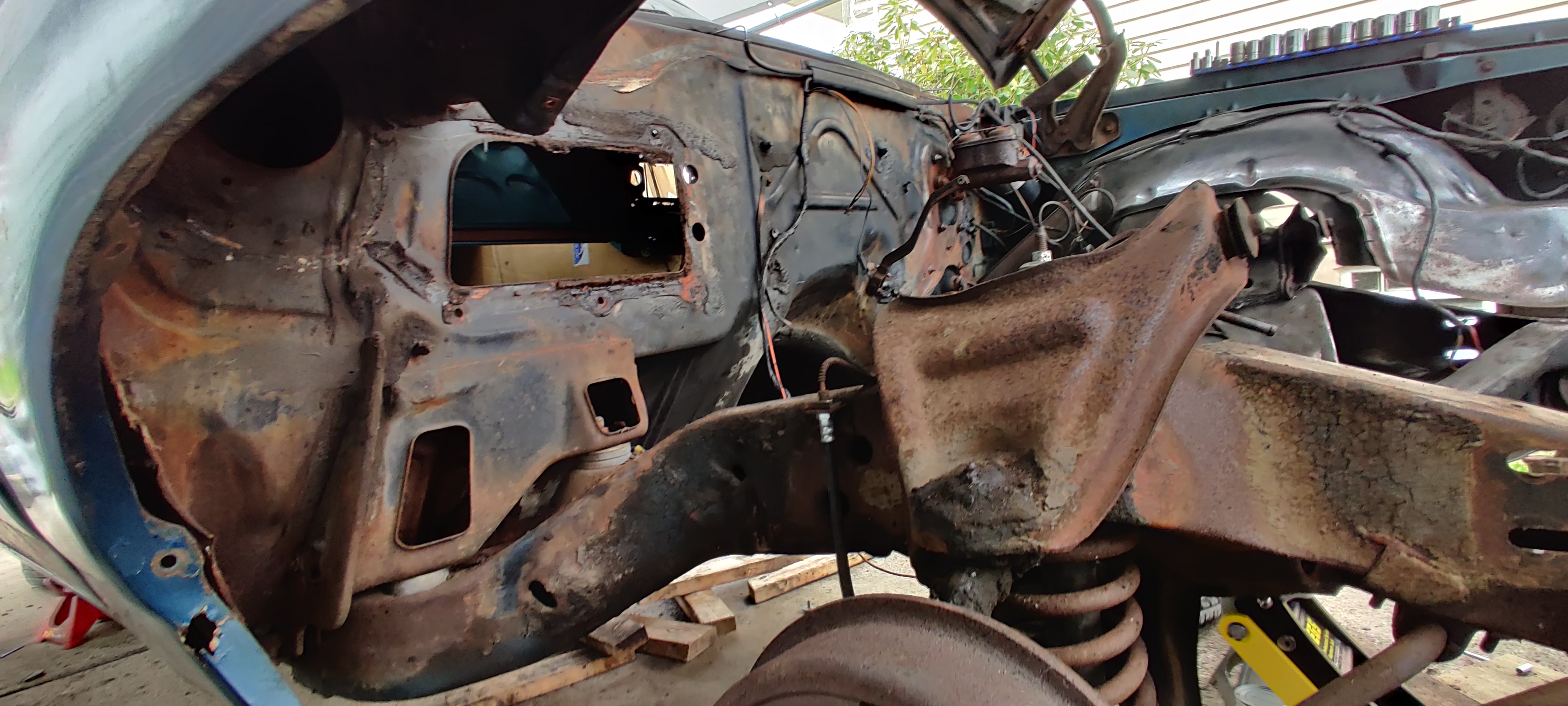 Engine Bay through wheel well opening